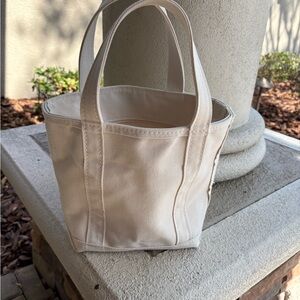Cream Canvas Tote Bag with Sturdy Handles and Reinforced Stitching